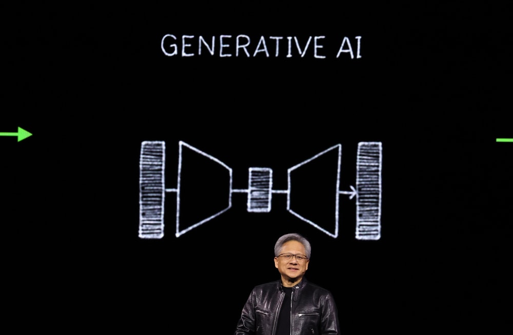 A man stands in front of a black screen displaying the words "GENERATIVE AI" at the top. Below the text, there is a simplistic graphic illustrating a funnel-like diagram with arrows pointing toward either side, symbolizing a process. The man is wearing a black leather jacket and has short gray hair, with a slight smile on his face, conveying a sense of enthusiasm or confidence.