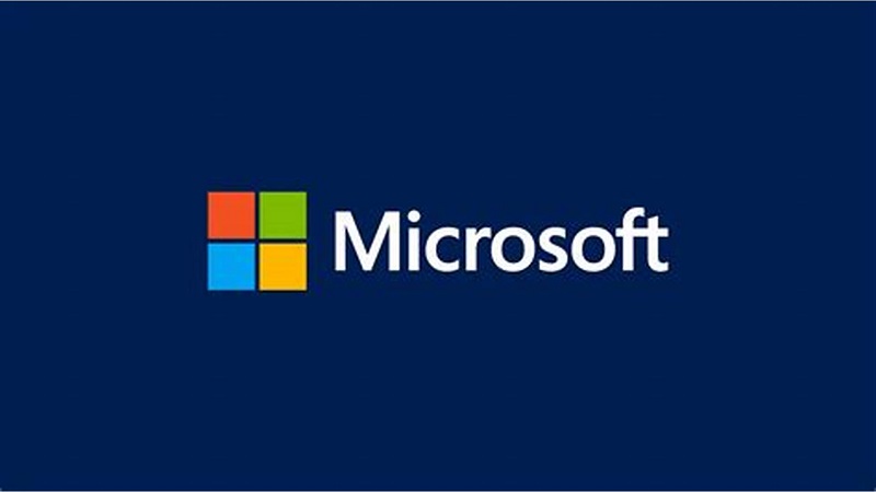 Microsoft logo featuring four colored squares in a grid pattern (red, green, blue, and yellow) alongside the word "Microsoft" in white text on a blue background.